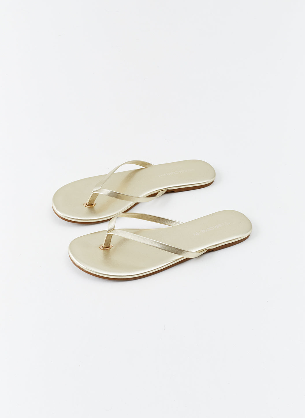 Womens fashion gold flip flops