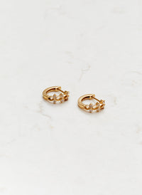 gold-crystal-mini-huggy-hoop-earrings_studio_image 