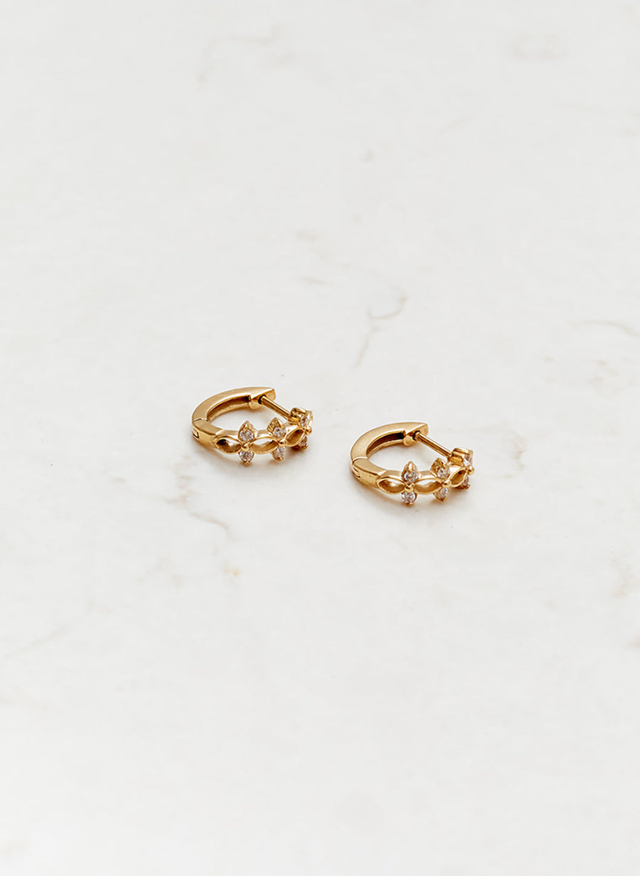 gold-crystal-mini-huggy-hoop-earrings_studio_image 