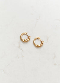 gold-crystal-mini-huggy-hoop-earrings_studio_image_2 