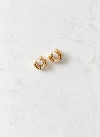 gold-huggy-hoop-earrings_studio_image 
