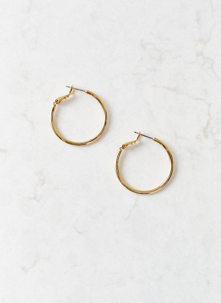 gold-small-hoop-earrings_studio_image 