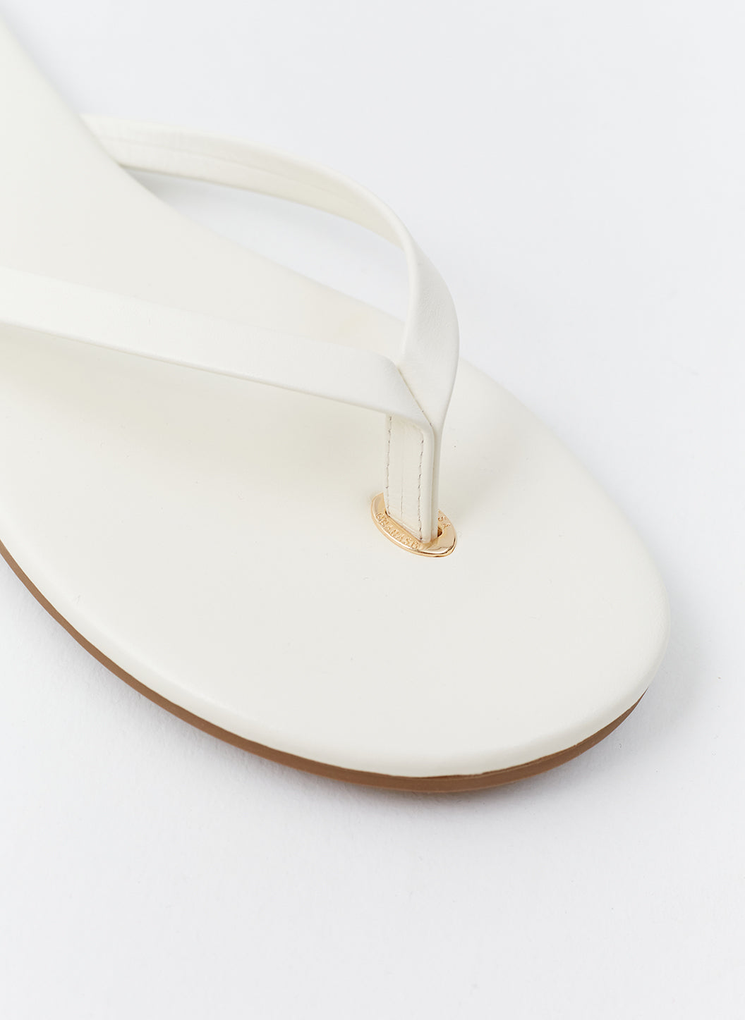 Ivory flip flops on sale