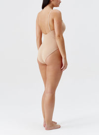 st-lucia-tan-swimsuit_curvemodel_2024_B