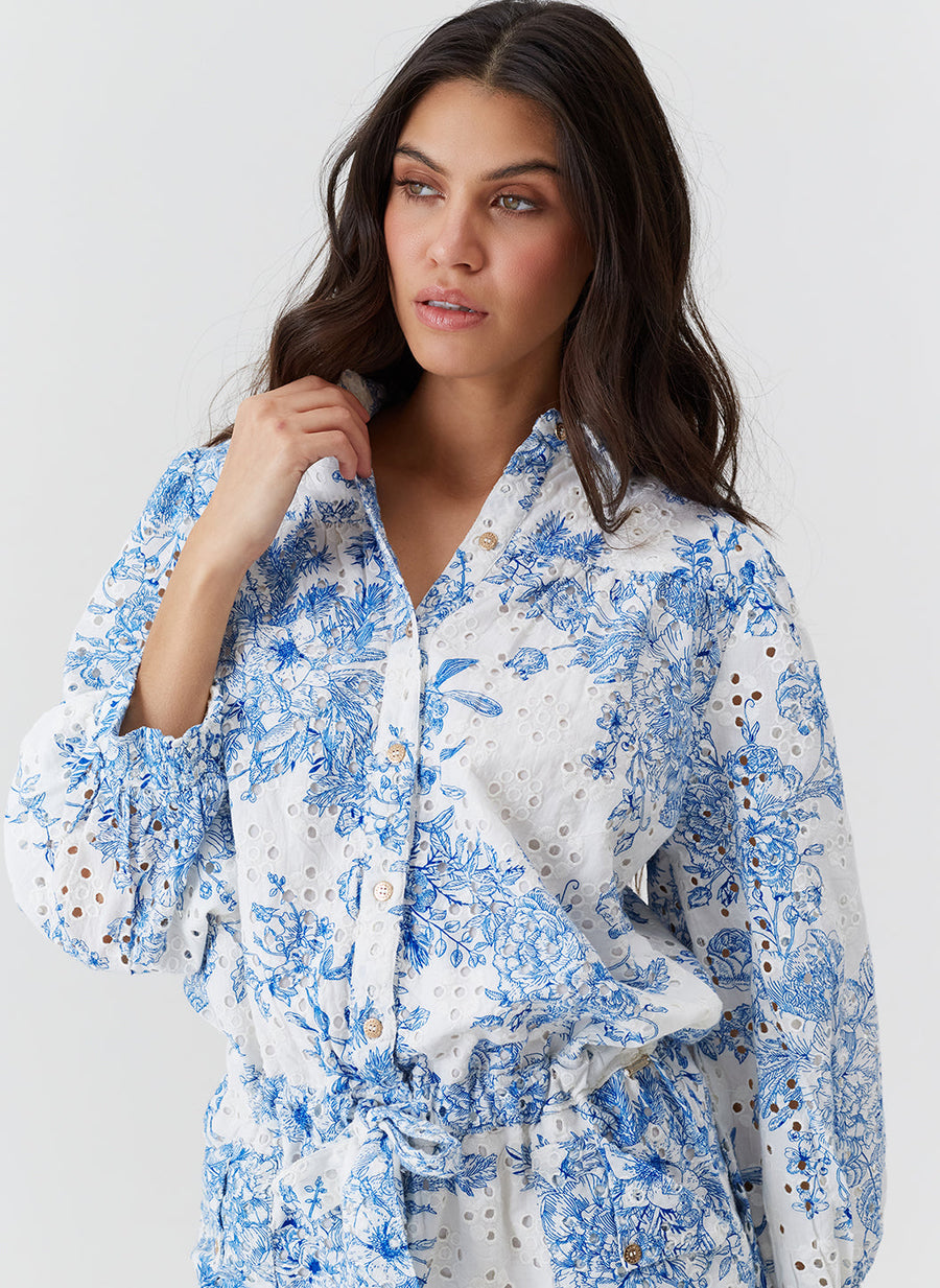 suri-coastal-navy-playsuit_model_2026_closeup 